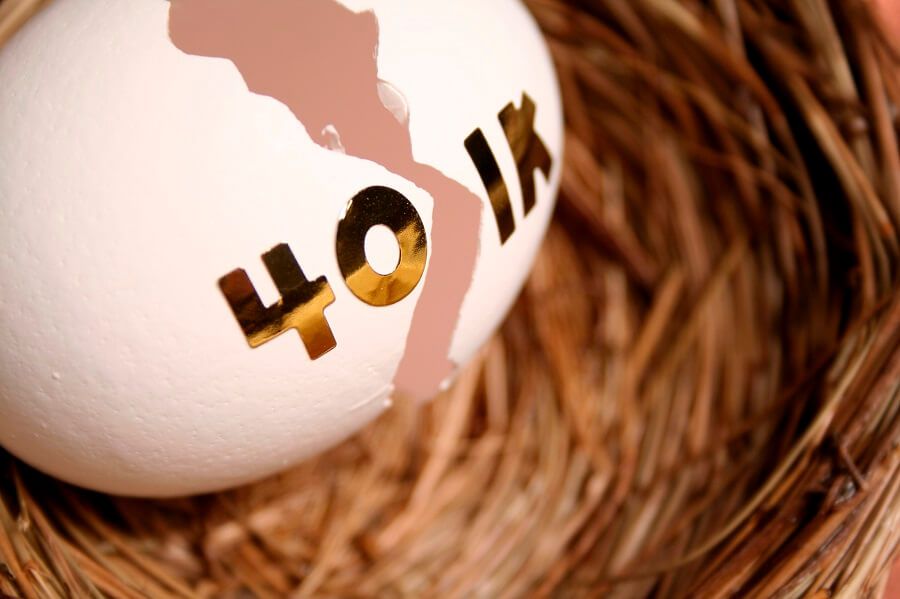 An egg labeled "401k" broken in a nest